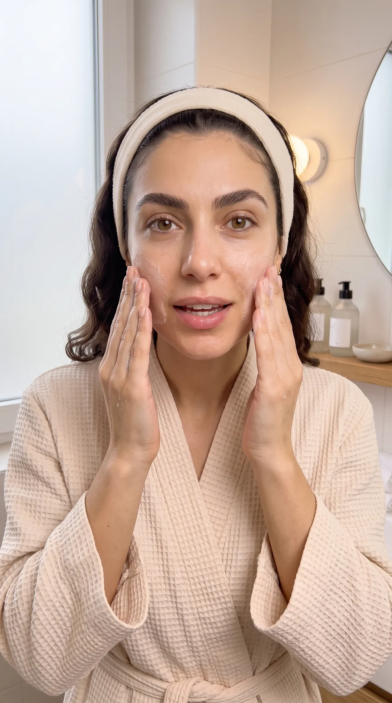Clip 2: Eleni massages in cleanser