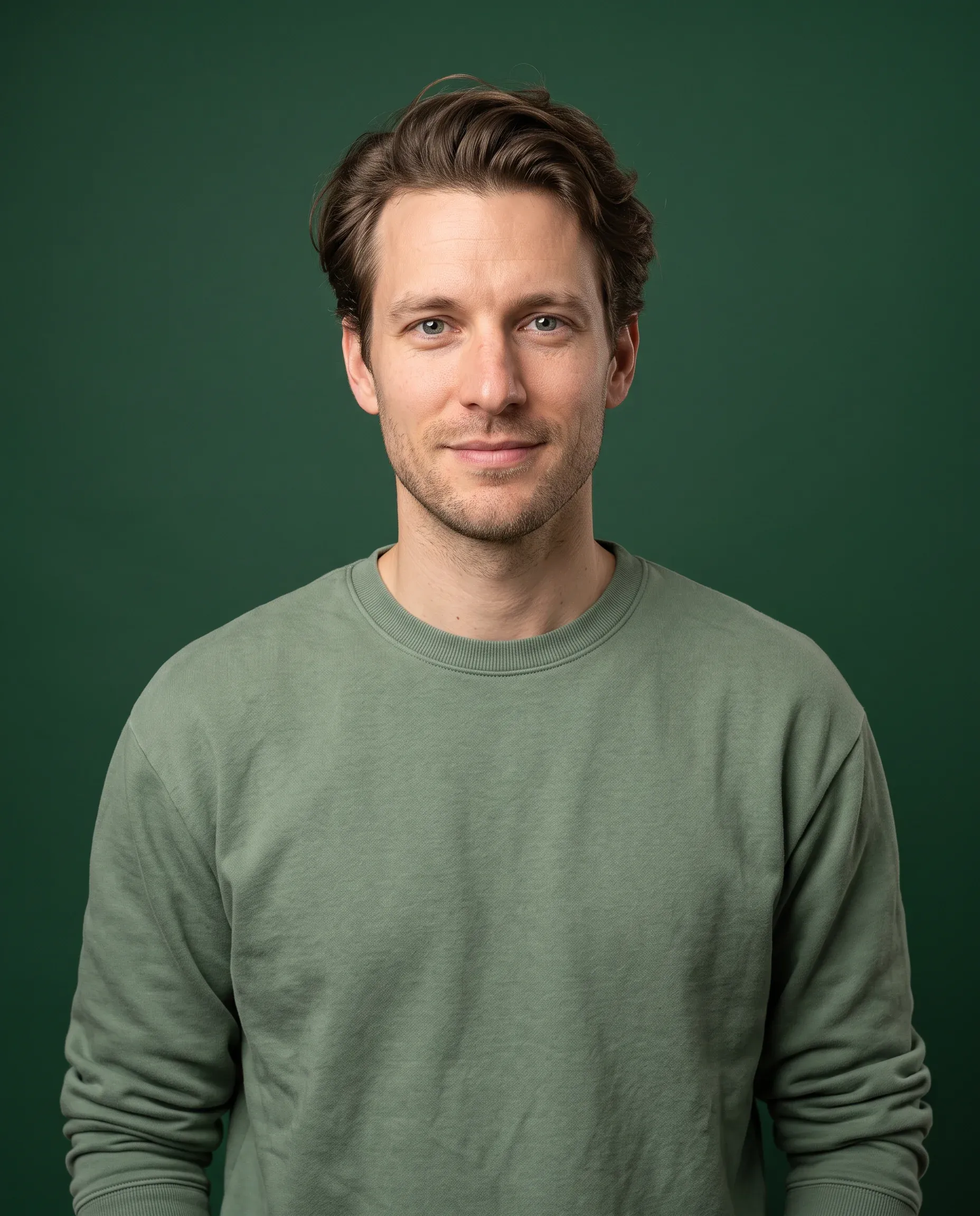 AI-generated man in a sage green sweater